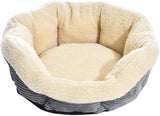 AmazonBasics - Cama para mascotas redonda y cálida, 56 cm