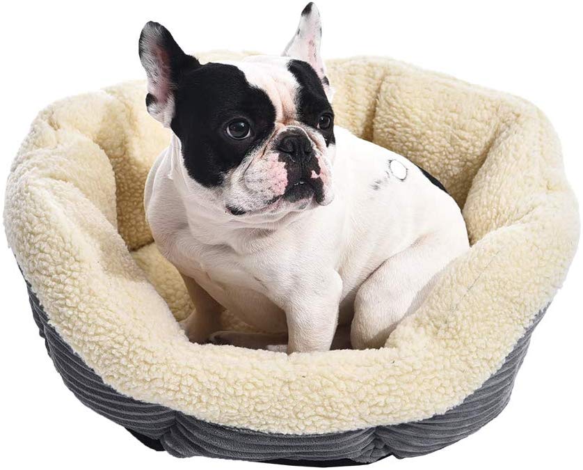 AmazonBasics - Cama para mascotas redonda y cálida, 56 cm